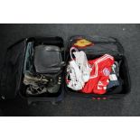 Two suitcases containing sports clothing,