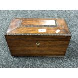 A Victorian rosewood tea caddy