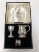 A boxed silver egg cup,