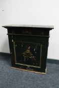 A continental wall cabinet with painted decoration