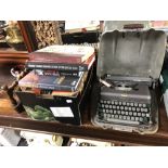 A vintage imperial typewriter in case together with a box of books, book of knowledge,