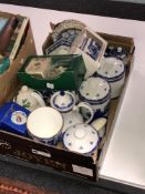 A box of boxed and unboxed Ringtons china, teapot,
