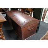 A nineteenth century stained pine dome topped trunk