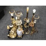 A tray of six continental brass table lamps, porcelain lamp and two others.