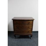 An early twentieth century mahogany three drawer chest