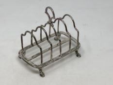 An antique silver five bar toast rack CONDITION REPORT: 158g.
