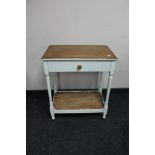 An Edwardian painted single drawer table