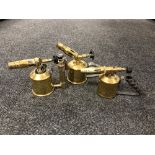 Three antique brass blow torches