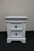 A contemporary white two drawer chest