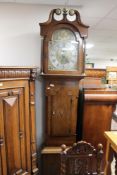 A nineteenth century mahogany and oak longcased clock with brass and silvered dial