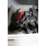 A large crate of power tools, commercial spray guns,