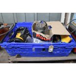 A crate of bench grinder, router,
