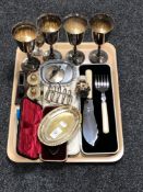 A tray of set of four plated goblets, cased fish servers, silver plated toast rack,