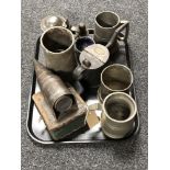 A tray of antique metal ware, pewter tankards,
