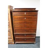 A nineteenth century mahogany seven drawer chest