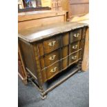 An oak three drawer chest