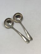 A pair of silver rat tail pattern ladles