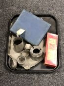 A tray of cased cutlery and antique pewter, tankard, napkin rings,