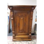 A continental carved side cabinet fitted with two drawers