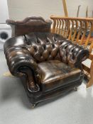 A brown buttoned leather Thomas Lloyd armchair