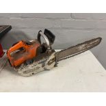 A petrol chain saw by Stihl