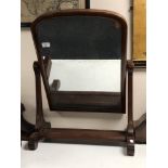 A large Victorian mahogany toilet mirror