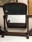 A large Victorian mahogany toilet mirror