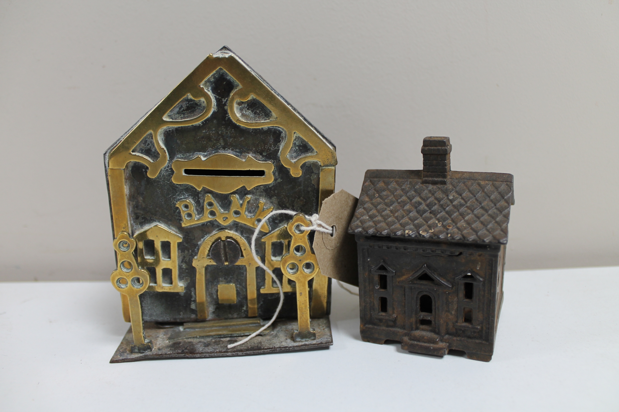 Two 19th century cast metal money boxes