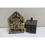 Two 19th century cast metal money boxes