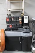 A commercial coffee making station and two tier trolley
