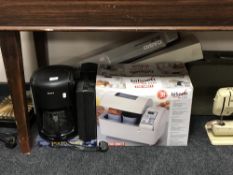 A boxed bread maker, Krups coffee maker, boxed drill,