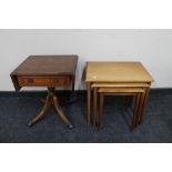 A nest of mahogany tables together with a small flap sided table