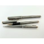 A Parker Sonnet silver ball point pen and a Parker USA silver fountain pen with 14ct gold nib and