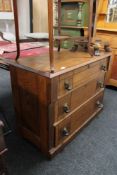 An antique oak three drawer chest