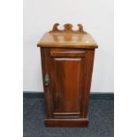 An Edwardian walnut pot cupboard