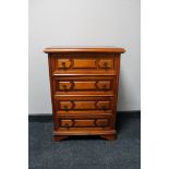 A contemporary four drawer chest