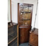 A mahogany display cabinet