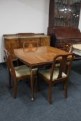 A Victorian D-shaped turnover top table on club feet
