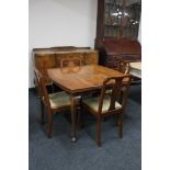 A Victorian D-shaped turnover top table on club feet