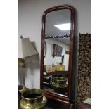 A mahogany arch topped hall mirror