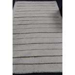 A flatweave rug,