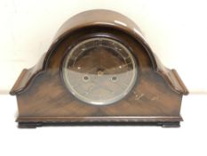 A 1930's walnut eight day mantel clock