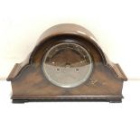 A 1930's walnut eight day mantel clock