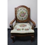 An Edwardian inlaid mahogany armchair