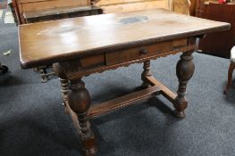 A heavy quality oak refectory style table on bulbous legs