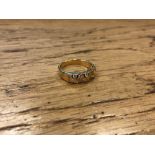 An 18ct gold diamond set ring