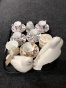 A tray of two Portuguese porcelain figures of doves,