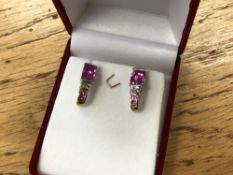 A pair of pink tourmaline and diamond earrings in two-tone gold