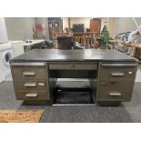 A mid century Milners office metal pedestal partners desk