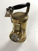 A vintage brass 'The Ceag' inspection lamp